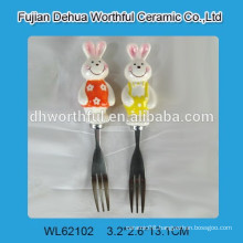 Kitchen butter fork with ceramic rabbit handle